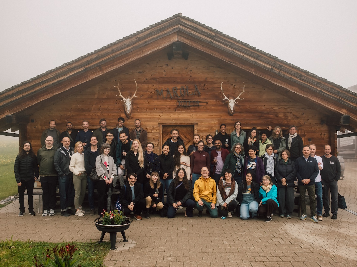 Group photo of attendees at the NOMIS Fellows Symposium in Lenzerheide, Switzerland